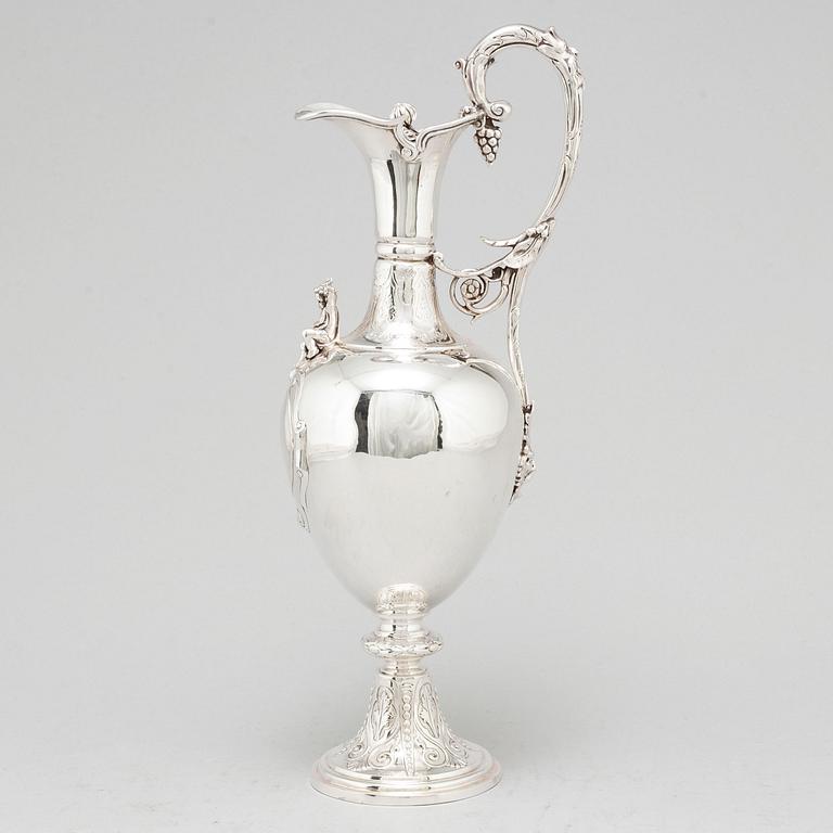 An English 19th century silver wine-jug, mark of Joseph Angle, London 1860.