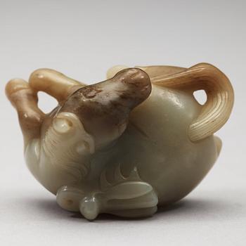 A nephrite figure of a recumbent horse, Qing dynasty (1644-1912).