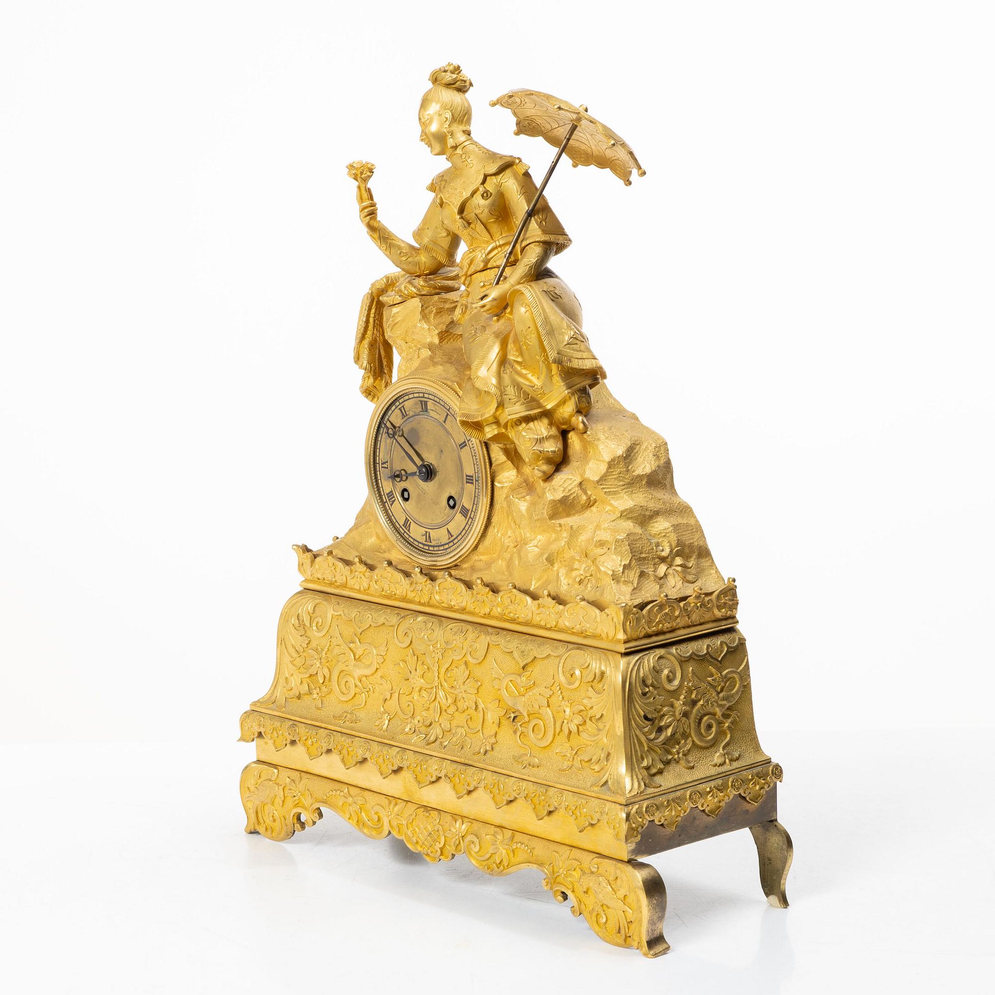 A Late Empire table clock, 19th century.