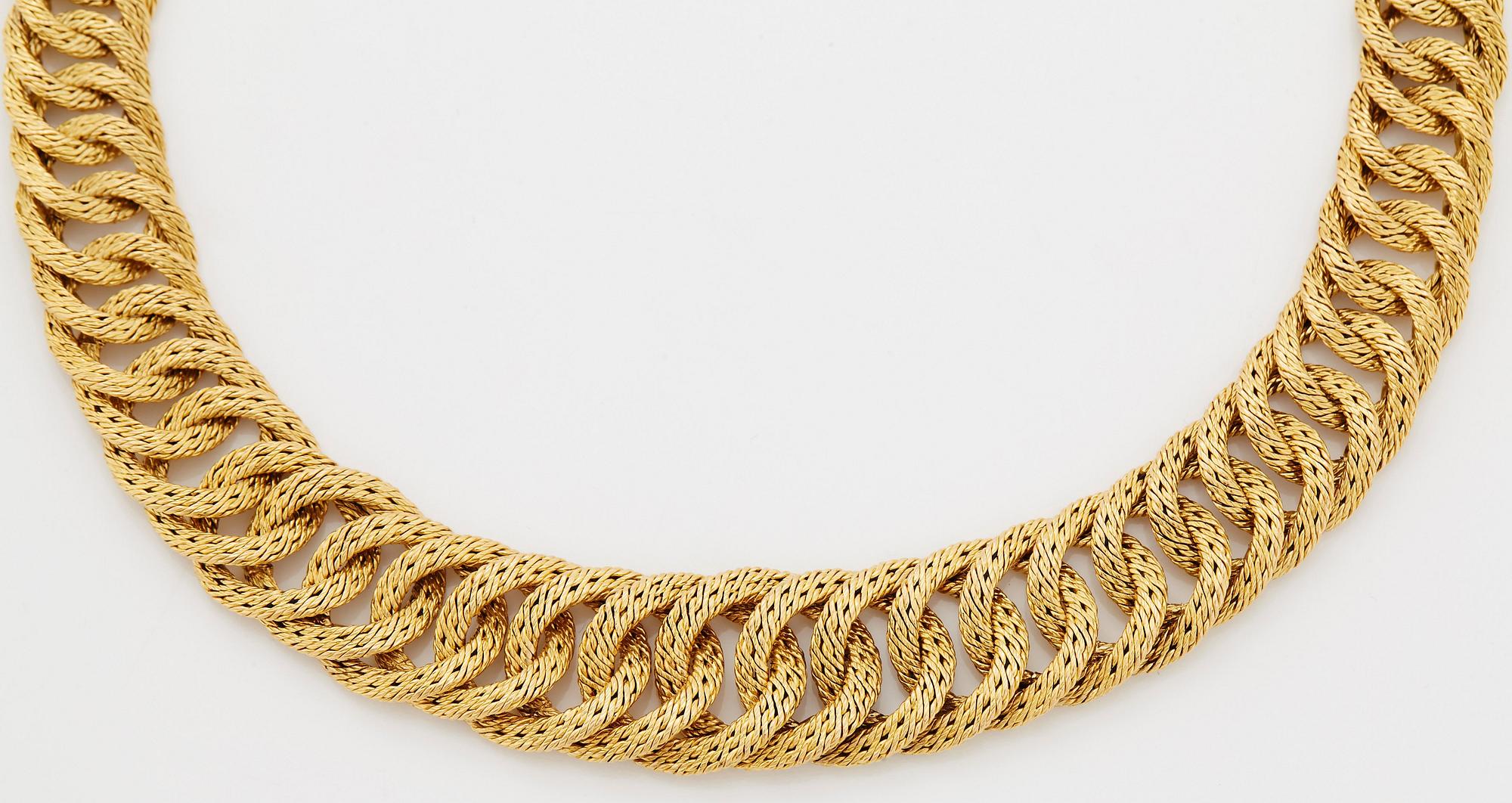 Georges L'Enfant an 18K gold demi parure comprising a necklace, a bracelet and a ring.