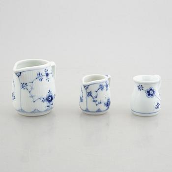 Three small jugs/creamers, a pair of small vases and two salt cellars, "Blue Fluted"/"Musselmalet", Royal Copenhagen.