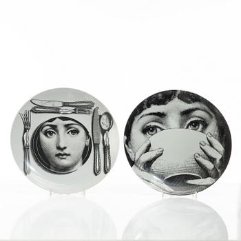 Piero Fornasetti, two 'Tema e Variazioni' porcelain plates, Milan, Italy.