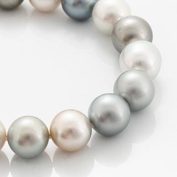 A cultured Tahitian and South Sea pearl necklace.