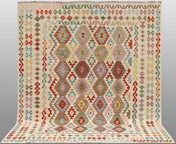 A Kilim rug, approx. 299 x 250 cm.