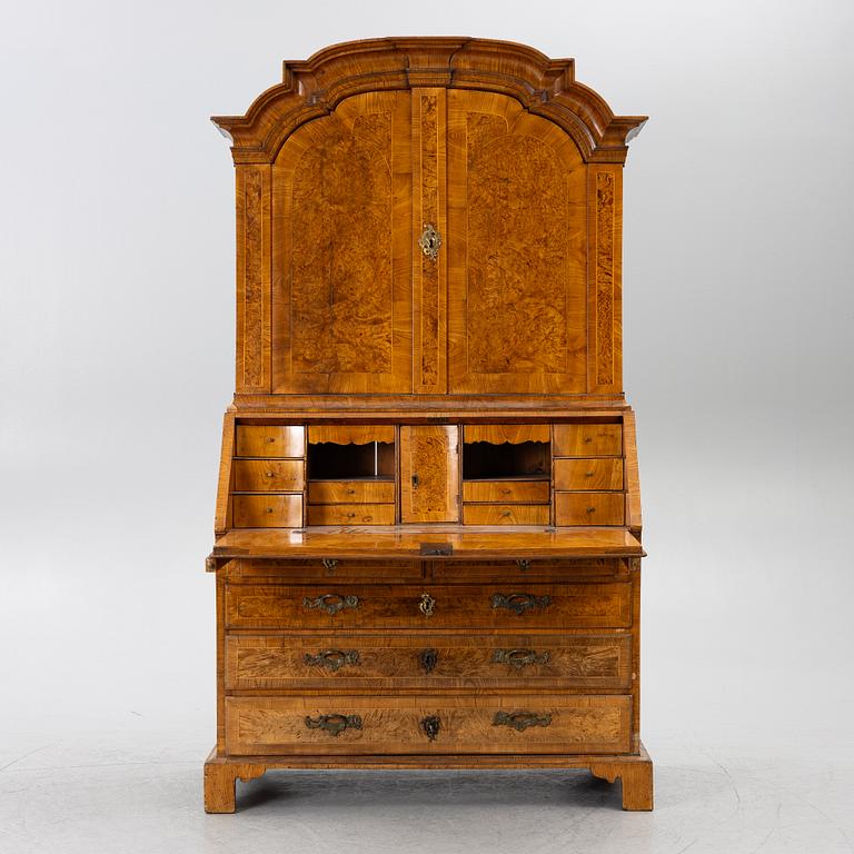 A Swedish rococo burr-alder veneered cabinet, later part 18th century.