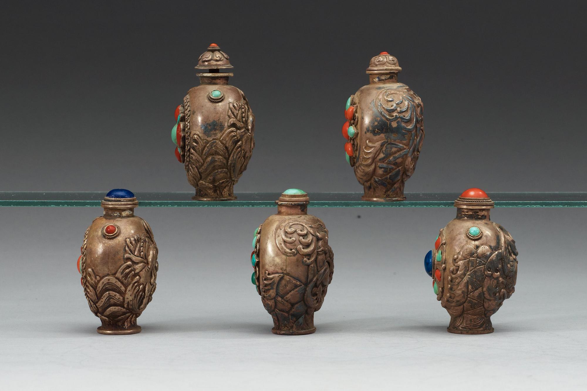 A set of five Tibetan snuff bottles with stoppers, ca 1900-.
