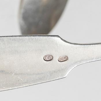 A silver cutlery set, Russia and Estonia, 19th-20th century, including Moscow 1879, St Petersburg 1890 (98 pieces).