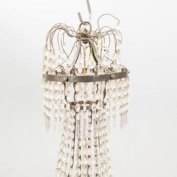 Chandelier in the Empire style, circa 1900.