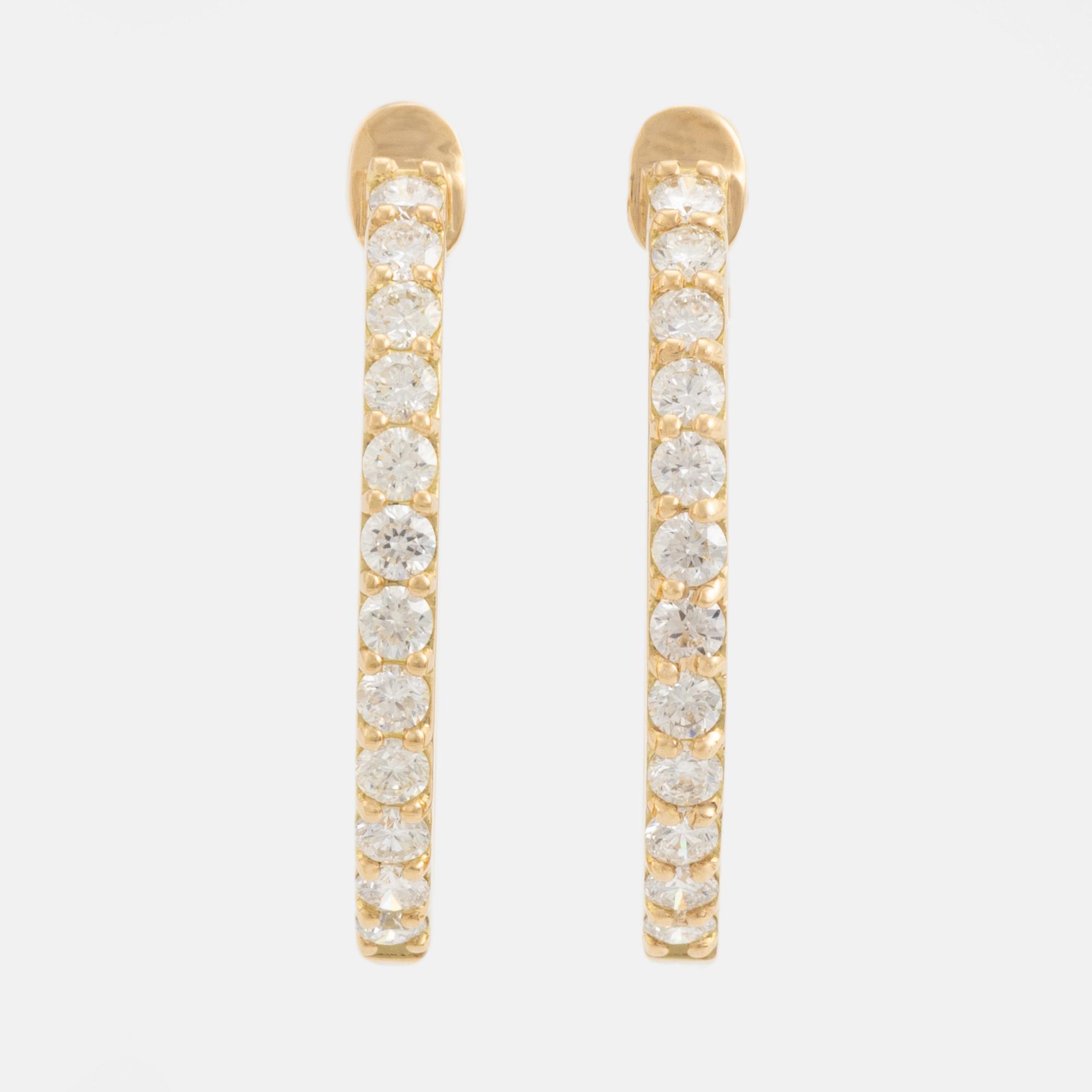 Brilliant cut diamond hoop earrings.