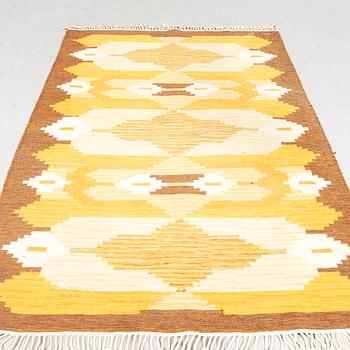 A Swedish signed flat weave carpet ca 225x165 cm.