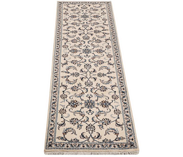 A runner carpet, Nain, part silk, ca 293 x 80 cm.