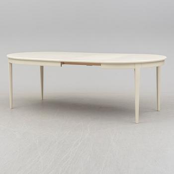 A dining table with six chairs by Carl Malmsten, Bodafors, 1960s.