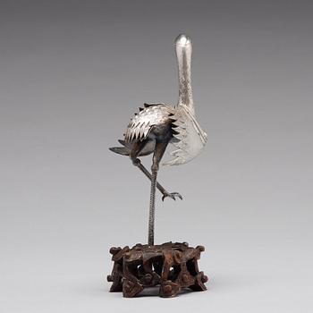 A silver crane, late Qing dynasty.