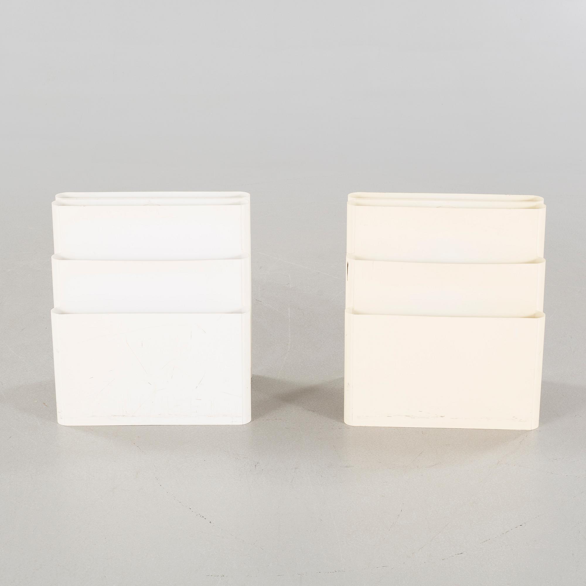 A pair of magazine racks, designed by Giotto Stoppino  for Kartell.