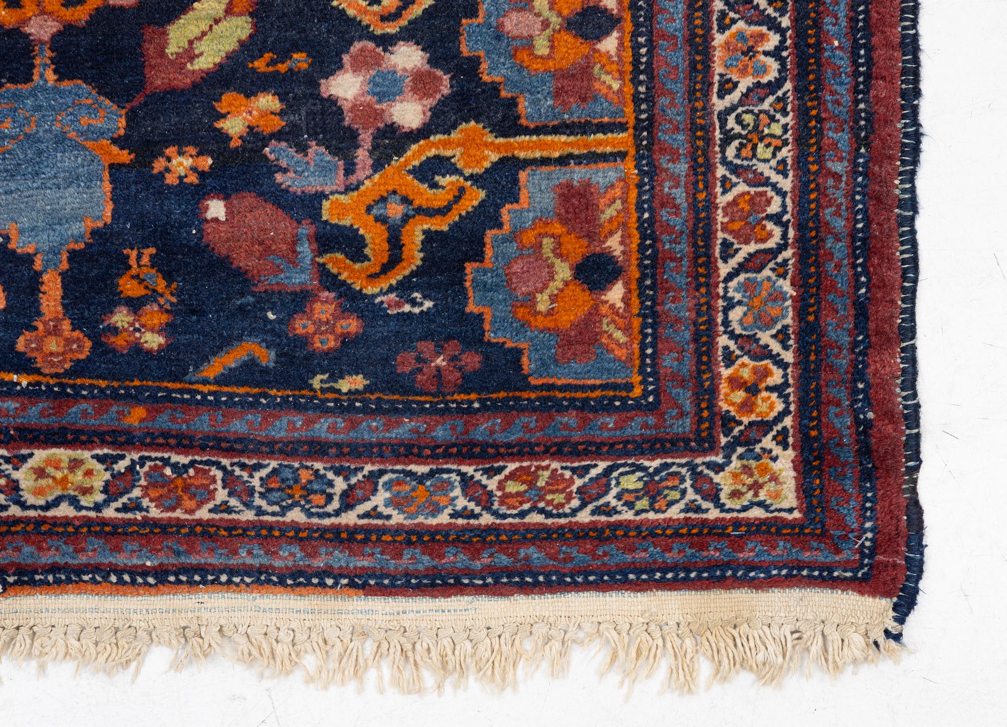 A north-west Persian, semi-antique runner, c. 340 x 110 cm.