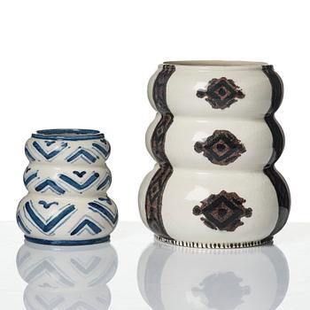 Wilhelm Kåge, a jar with cover, and four vases, creamware and porcelain, Gustavsberg, Sweden, 1917-1920.