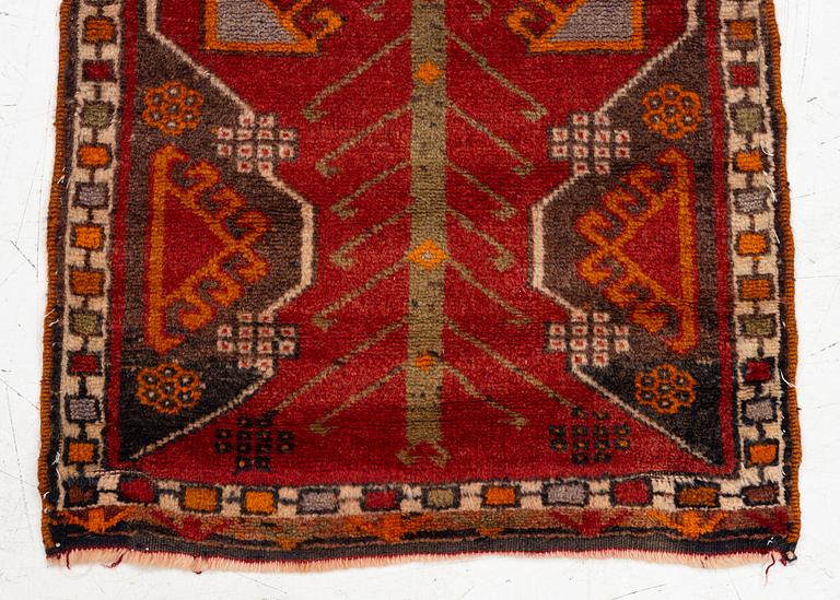 An antique, central Anatolian yastik fragment, c. 113 x 53 cm.
