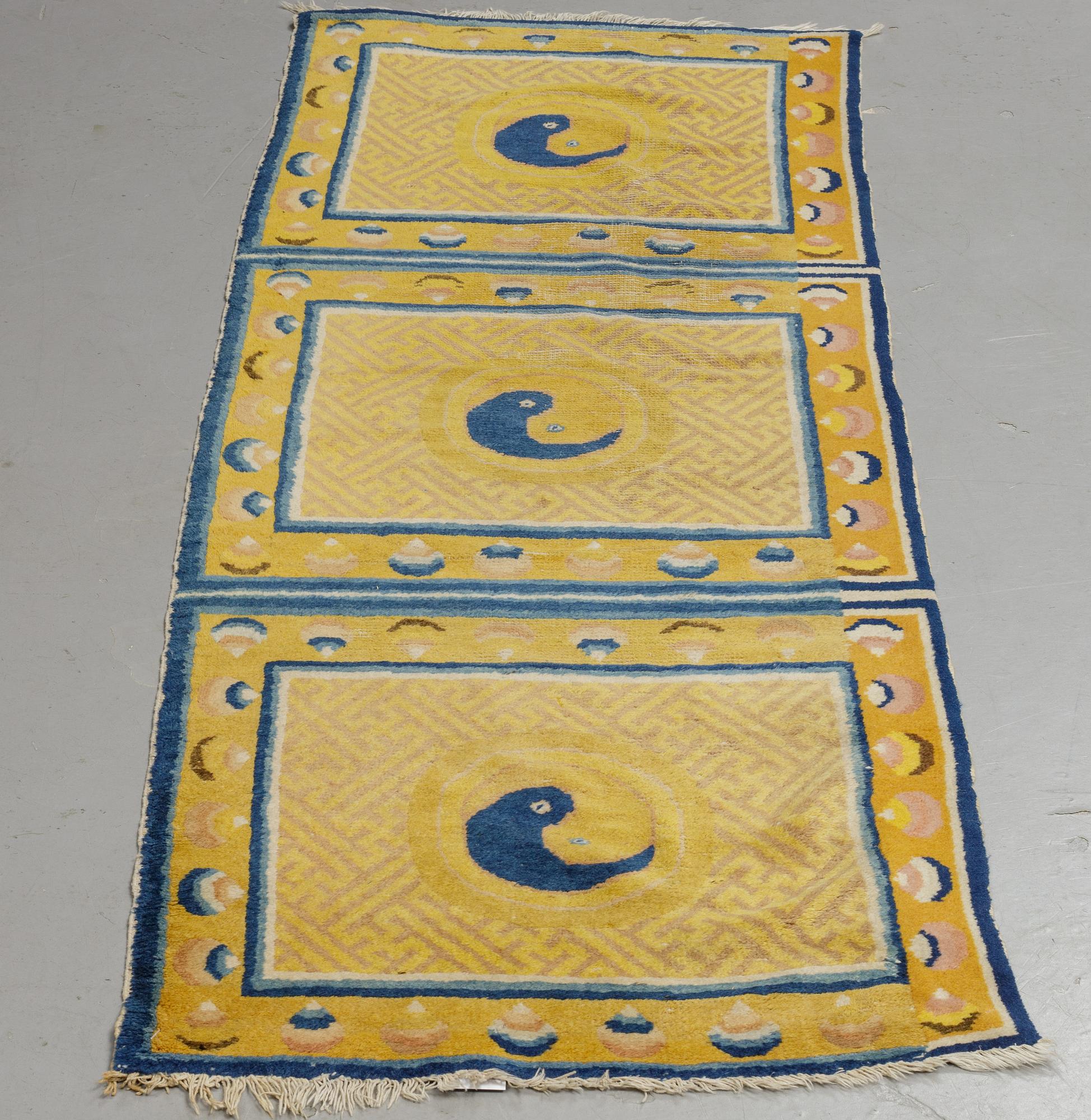 An antique Ningxia meditation rug, ca 201 x 69 cm.