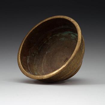 A Tibetan bronze bowl, 19th Century.