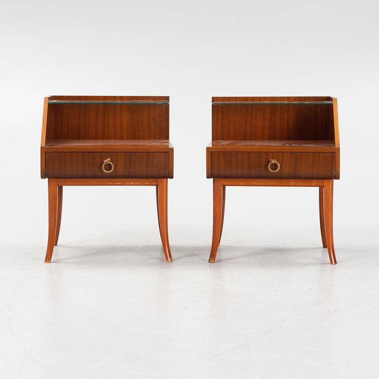 A pair of Swedish Modern mahogany veneered bedside tables, 1940's.