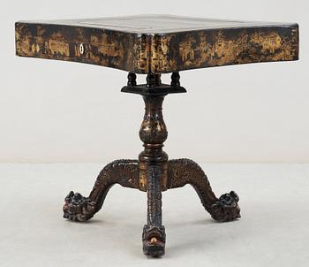 A lacquer games table. Qing dynasty, 19th Century.