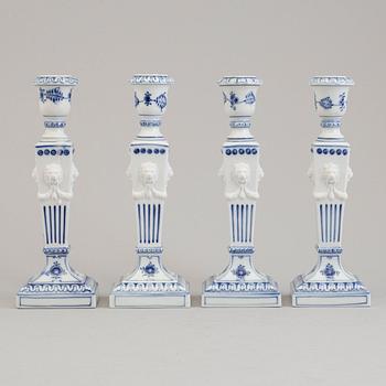 Two pairs of porcelain candlesticks by Royal Copenhagen, Denmark, third quarter of the 20th century.