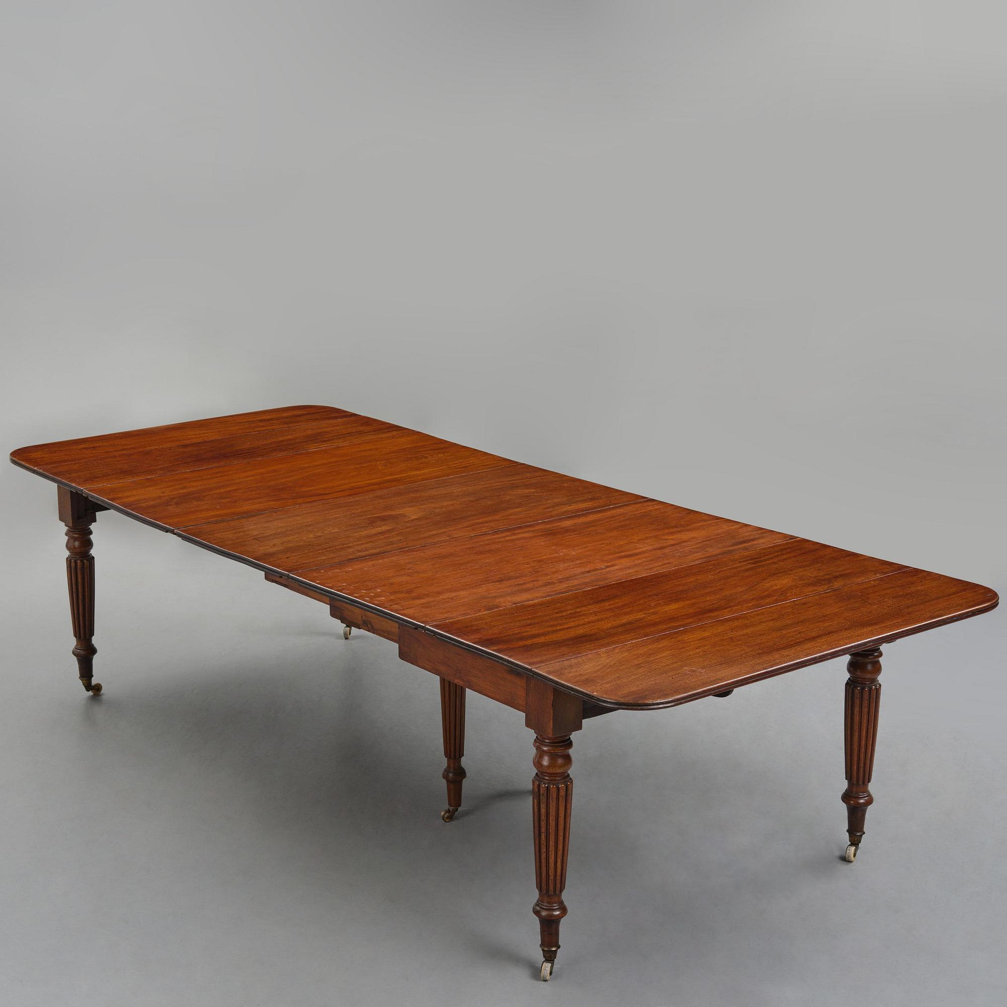 A Regency mahogany dining table, first part 19th century.