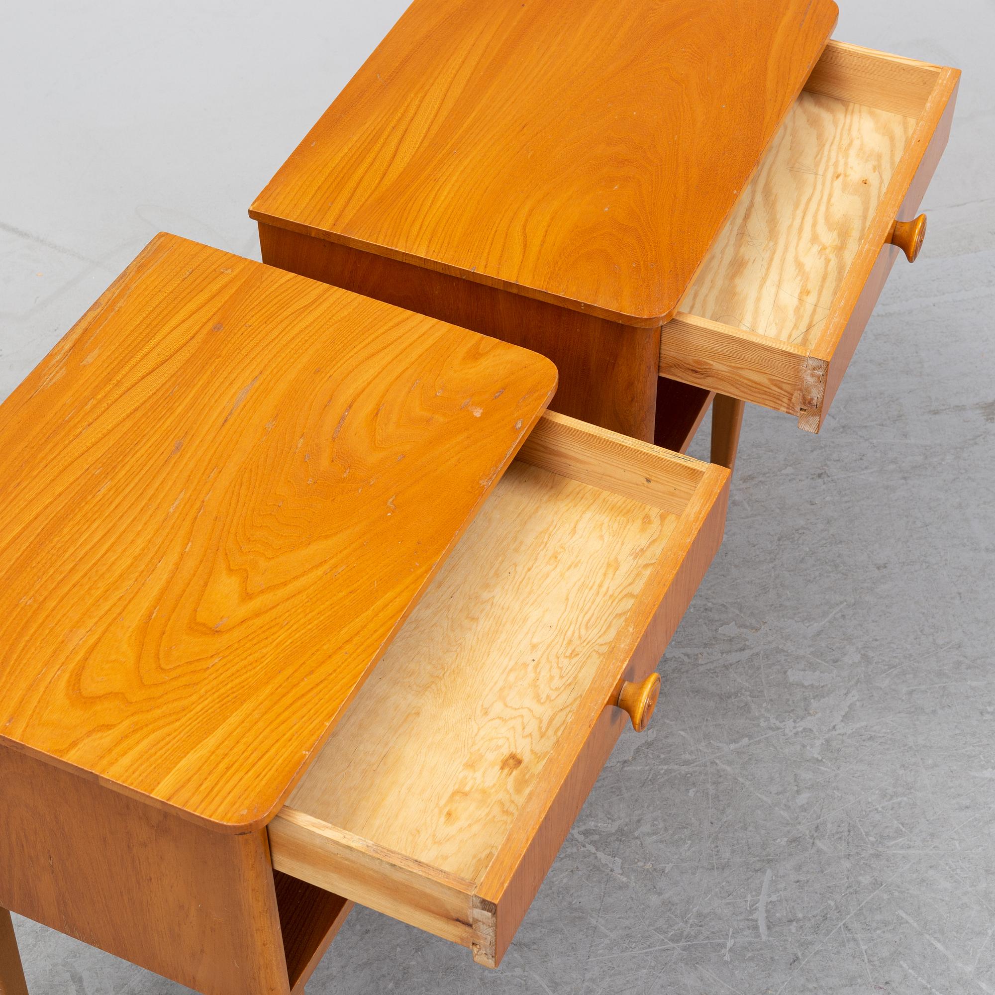 A pair of elm wood bedside tables, mid 20th Century.