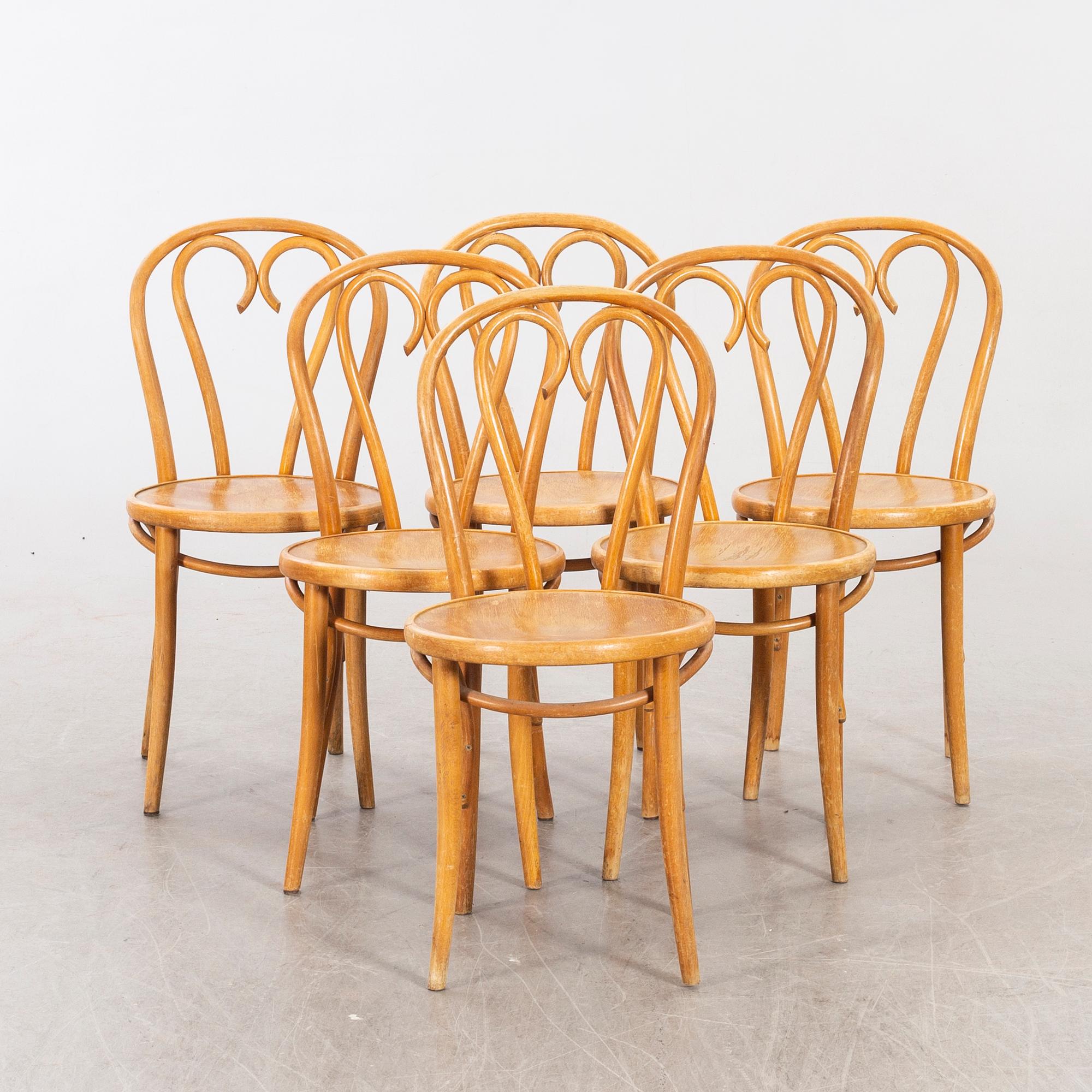 A SET OF SIX BENTWOOD CHAIRS.
