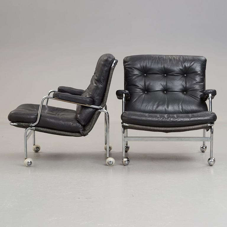 Bruno Mathsson, a pair of "Karin" easy chairs, DUX, Sweden, post 1969.