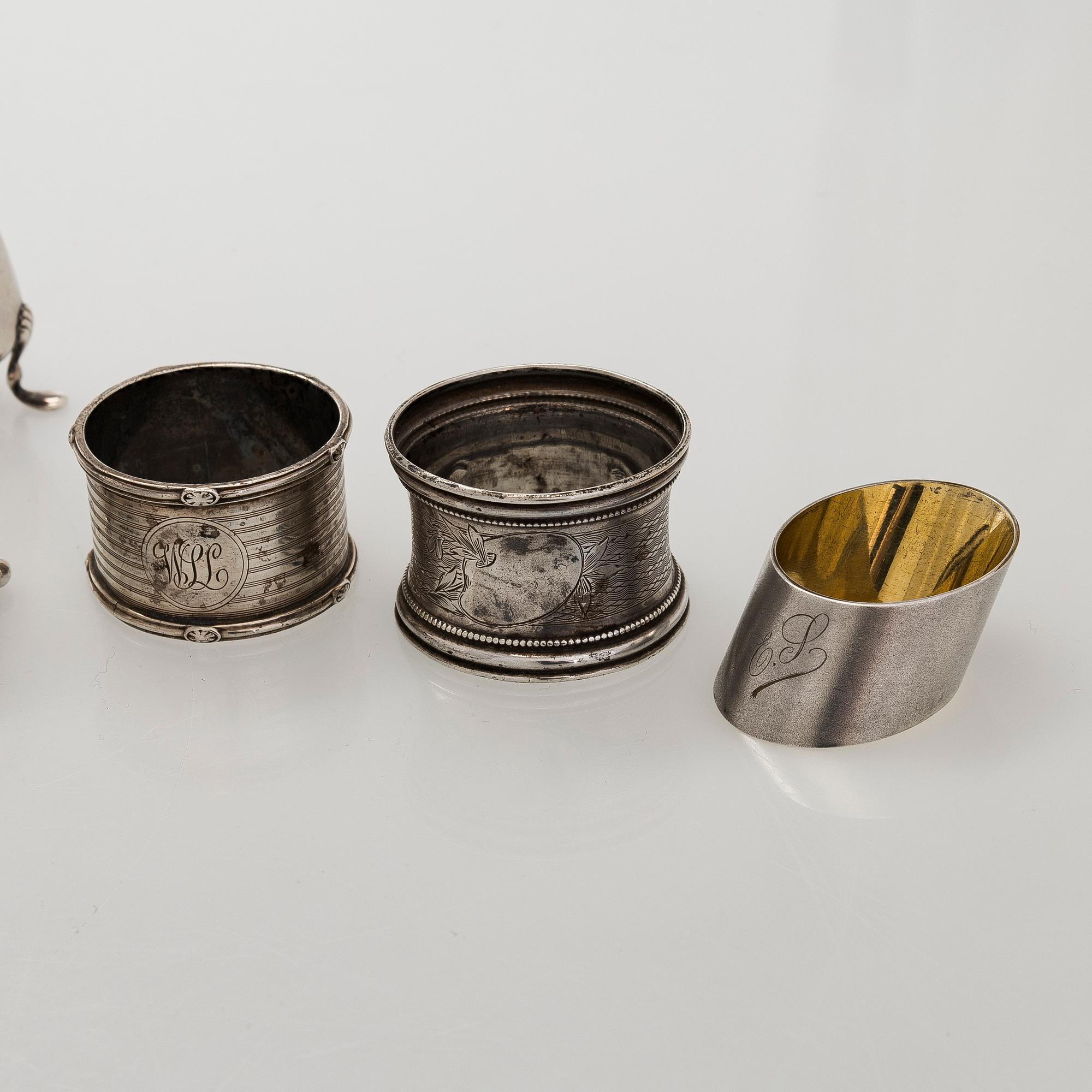 Napkin rings, 6 pcs, a pair of salt shakers, and salt cellars, silver and glass, including English and Finnish marks.