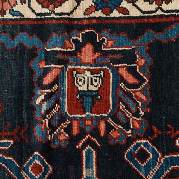 A CARPET, an antique Bakshaish, ca 693 x 398,5 cm, dated "1298"AH/1880 AD probably.