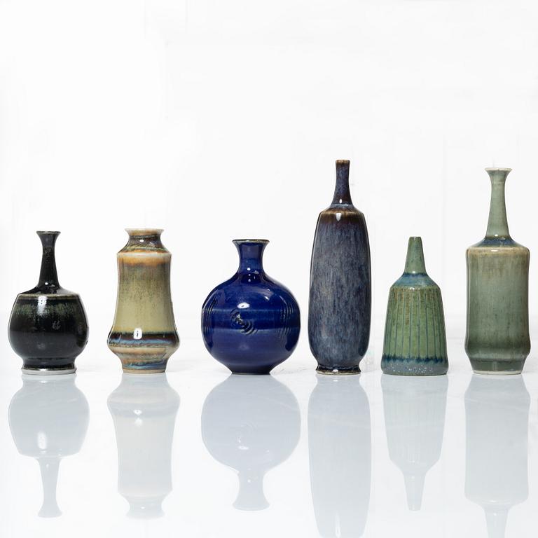 A set of fourteen stoneware vases and ten bowls, predominantly John Andersson, Höganäs.