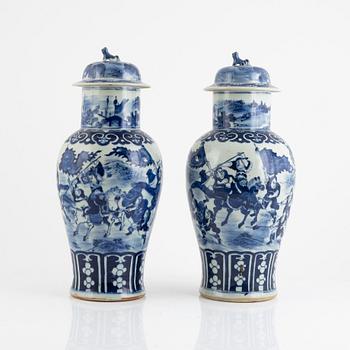 A pair of blue and white urns with covers, China, 19th century.