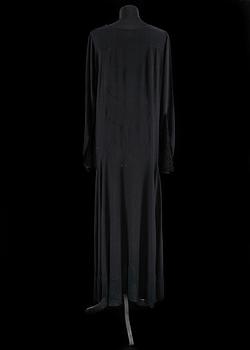 A 1910s/20s black evening dress.