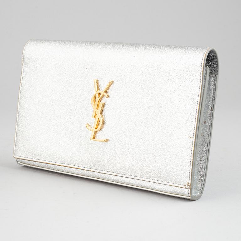 Yves Saint Laurent, a clutch.