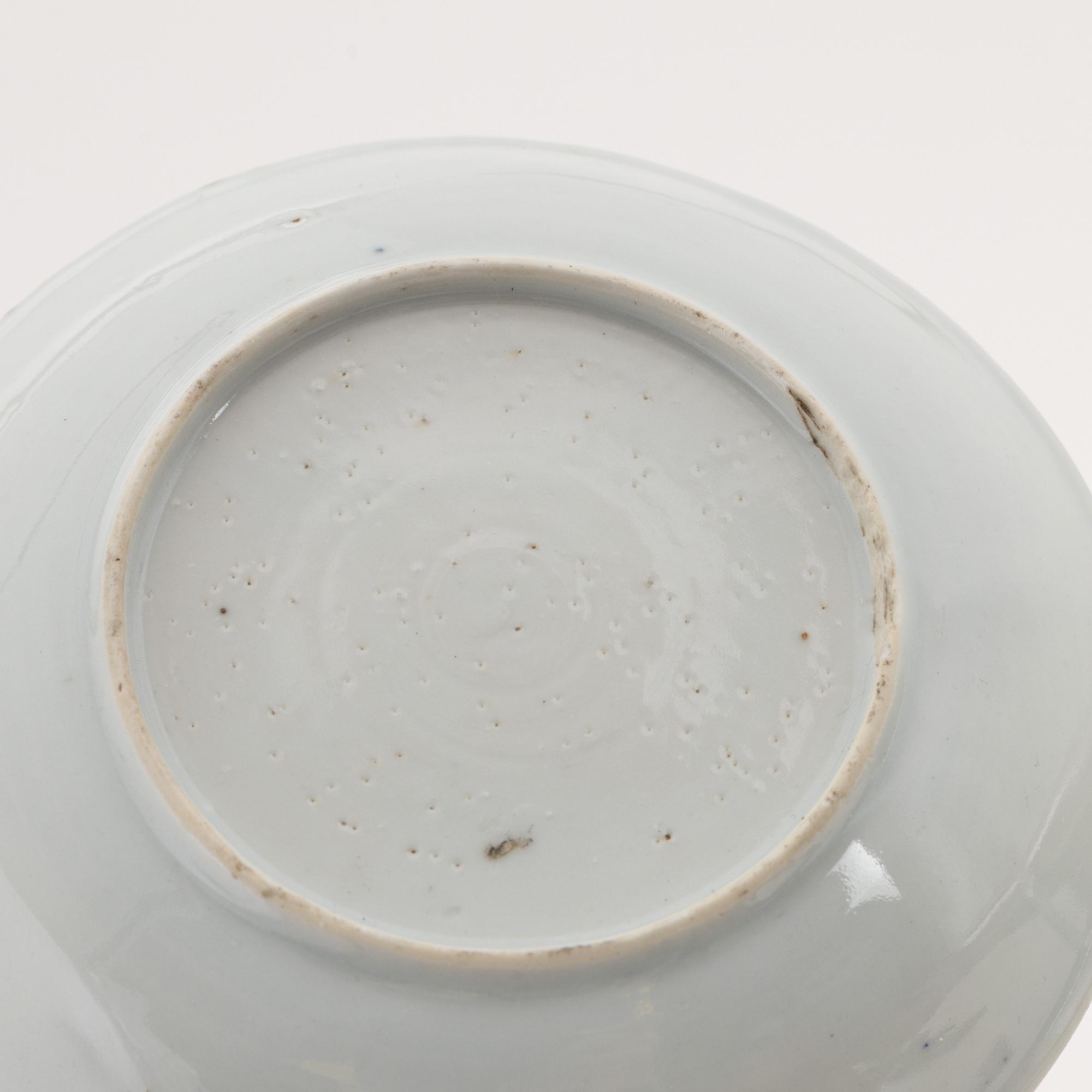 A famille rose cup with stand, a dish and a single cup, Qing dynasty, Qianlong (1736-95).