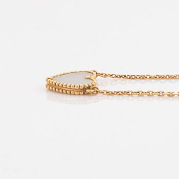 Van Cleef & Arpels, 18K gold and mother of pearl Alhambra heart necklace.