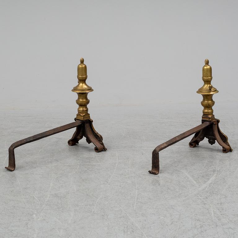 A pair of baroque bronze andirons, early 18th century.