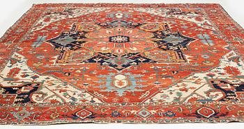 An antique Heriz Serapi carpet, north west persia, c 400-405 x 337 cm.