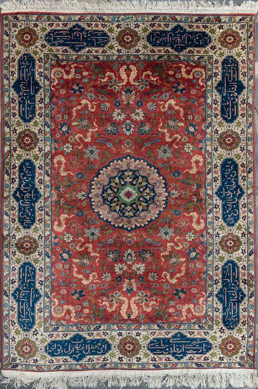 An oriental carpet. Circa 177x126 cm.