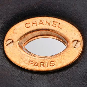 CHANEL, a quilted black leather shoulder bag, "Flap bag".