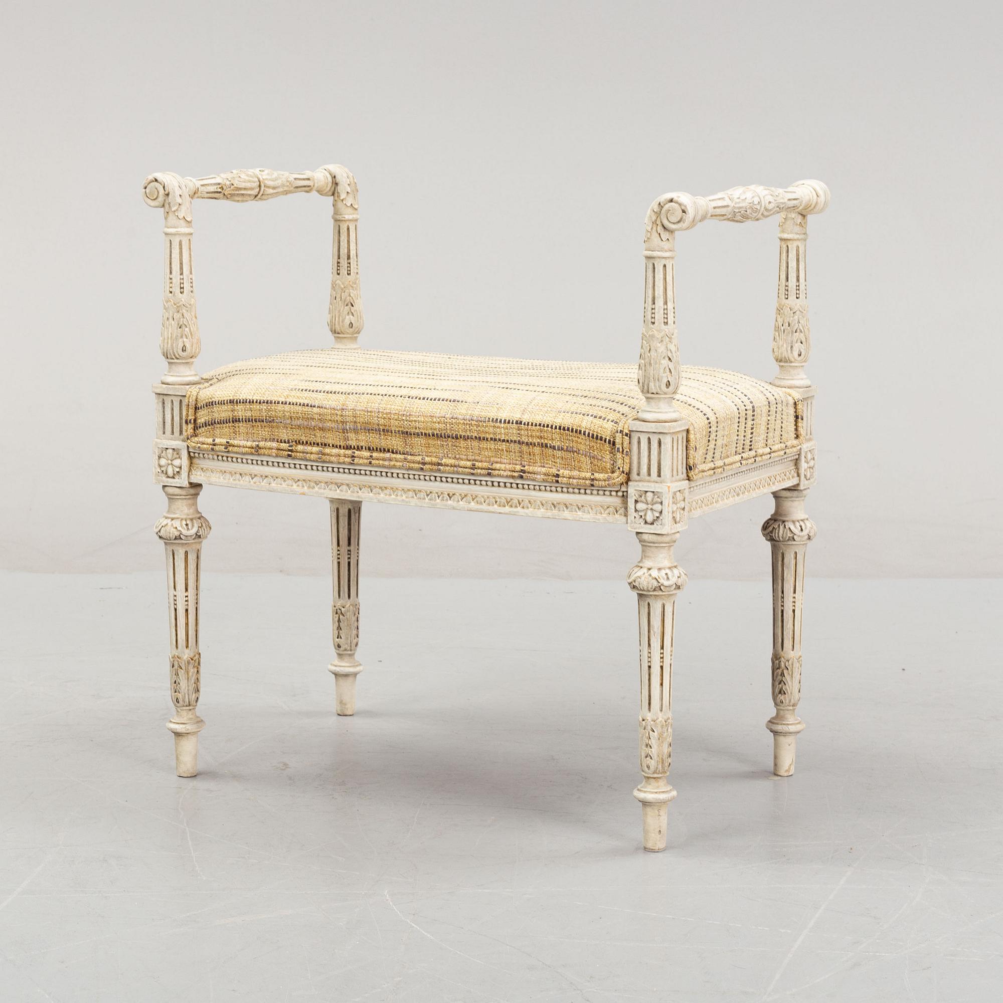 An early 20th Century Louis XVI style banquet stool.