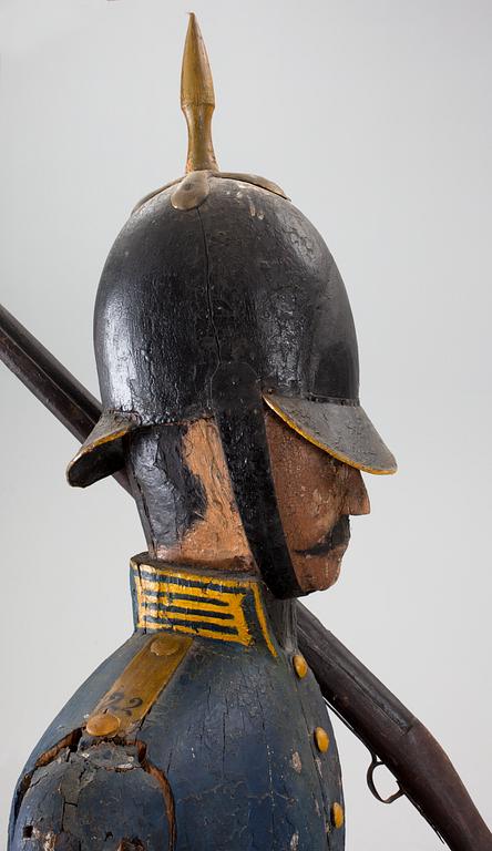 A Swedish 19th Century wooden sculpture.