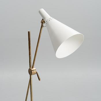 TAPIO WIRKKALA, AN ADJUSTABLE FLOOR LAMP, K10-11. Manufactured by Idman Oy. Designed 1958.