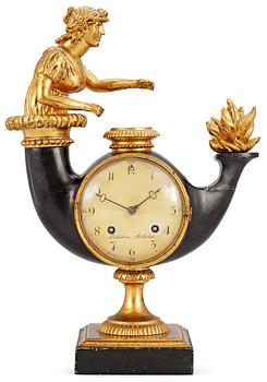 A Swedish Empire wooden mantel clock by I. Dahlström.