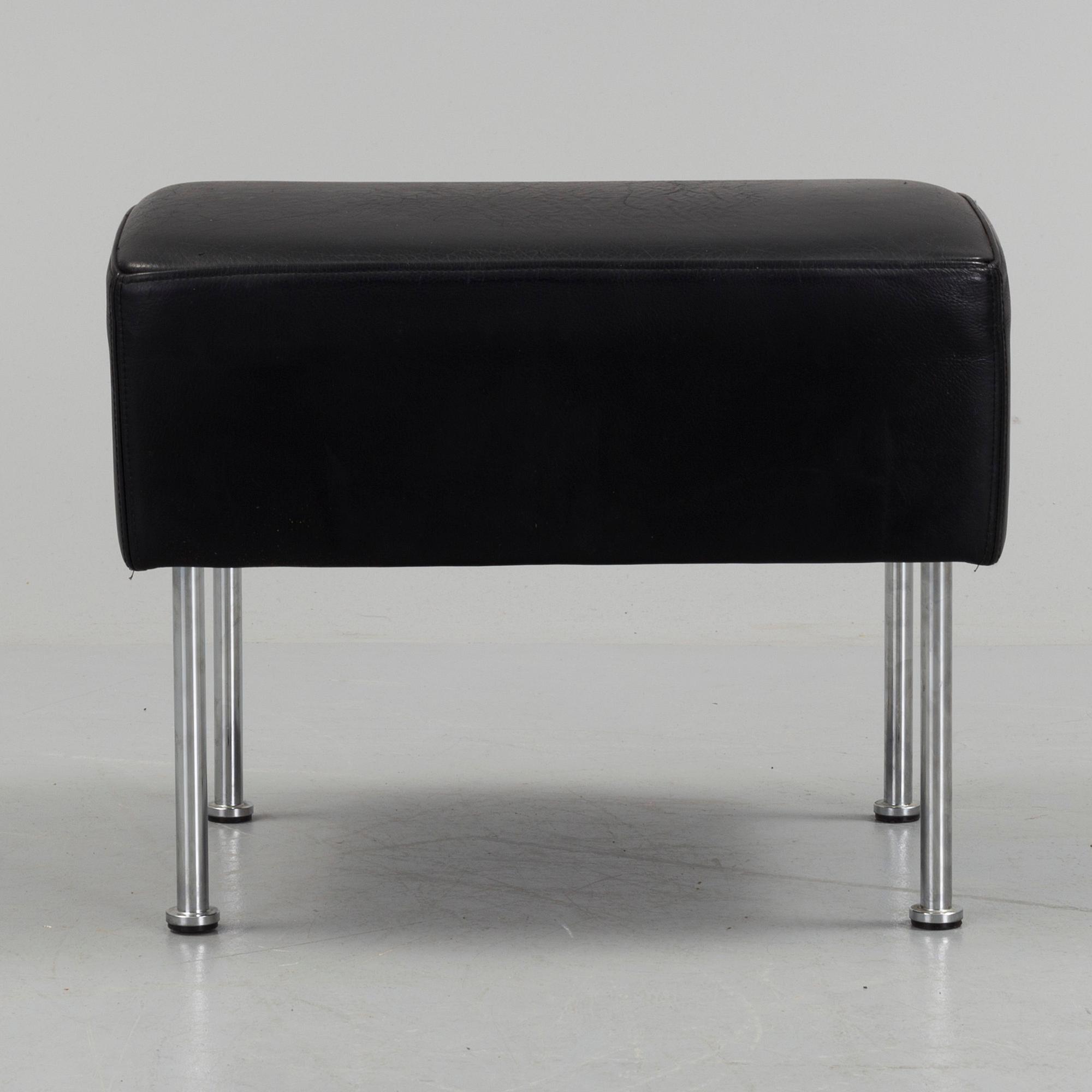 A "Cinema" footstool by Gunilla Allard.