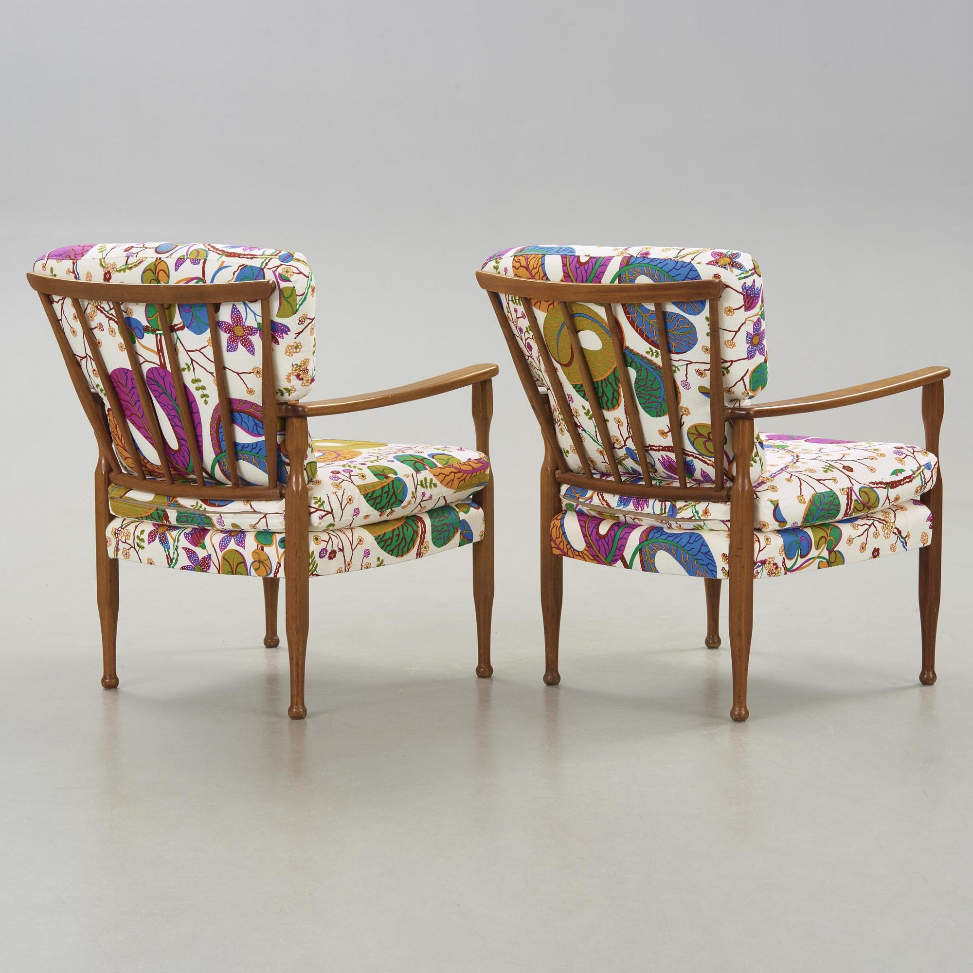 A pair of Josef Frank mahogany armchairs for Svenskt Tenn, model 891.