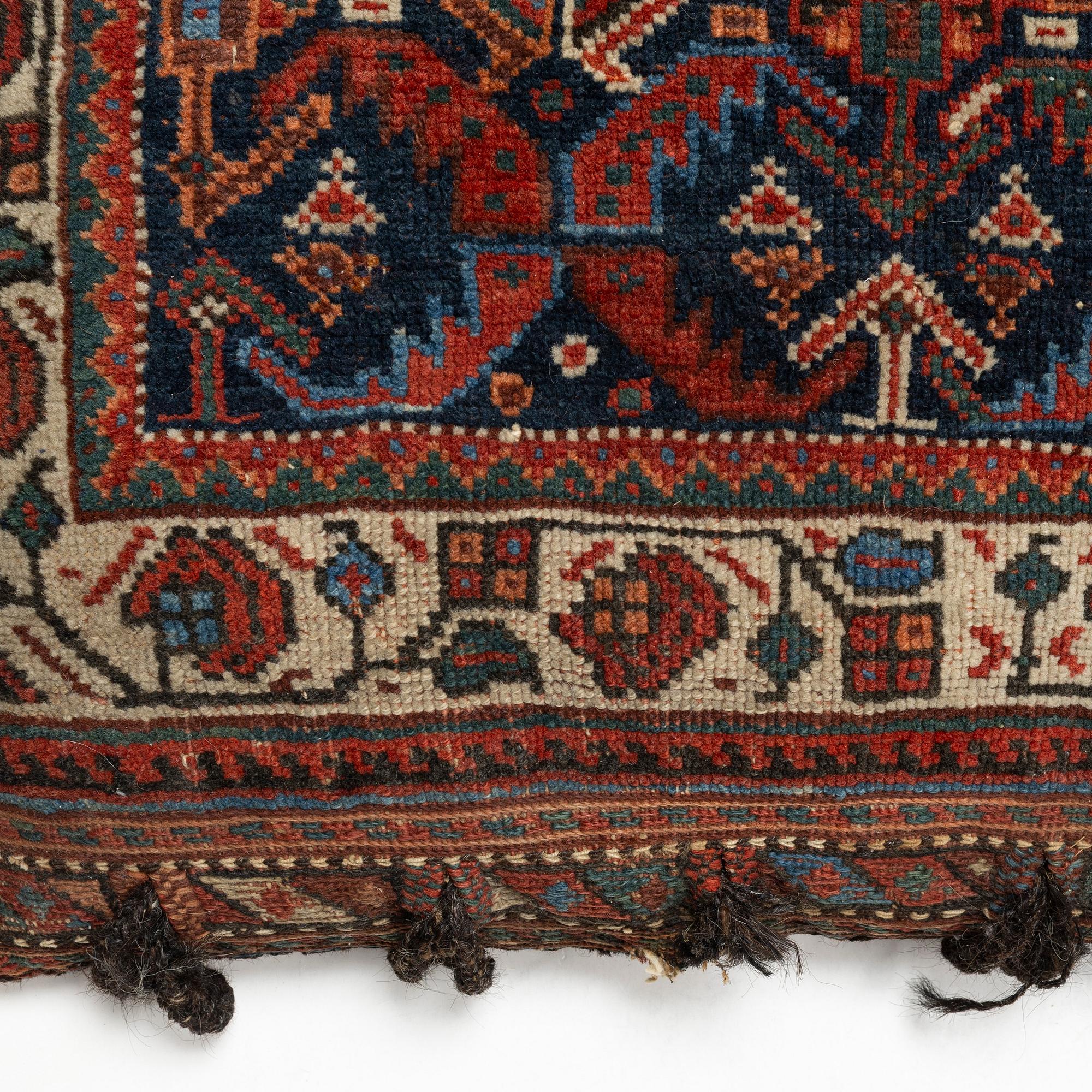 A Kashgai cushion, a. 64 x 51 cm.