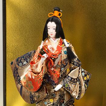 Four late 20th century Japanese dolls.